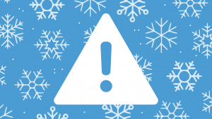 alert icon on snowflake background