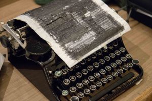 Typewriter and paper