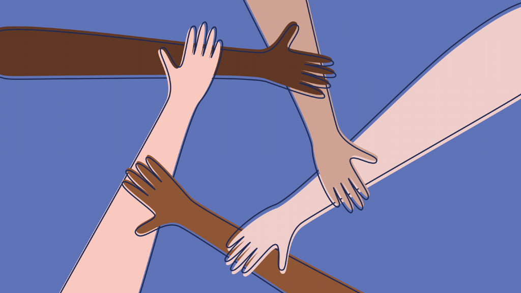 hands of various skin tones coming together to form a circle