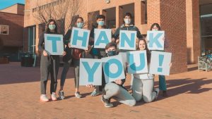 Group of UNC students hold letters that spell "Thank You"