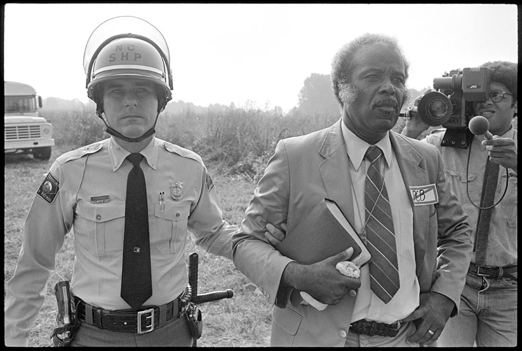 Reverend Leon White and North Carolina State Highway Patrol trooper.