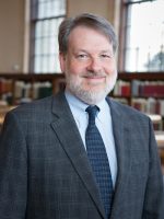 Professional headshot of Tim Shearer